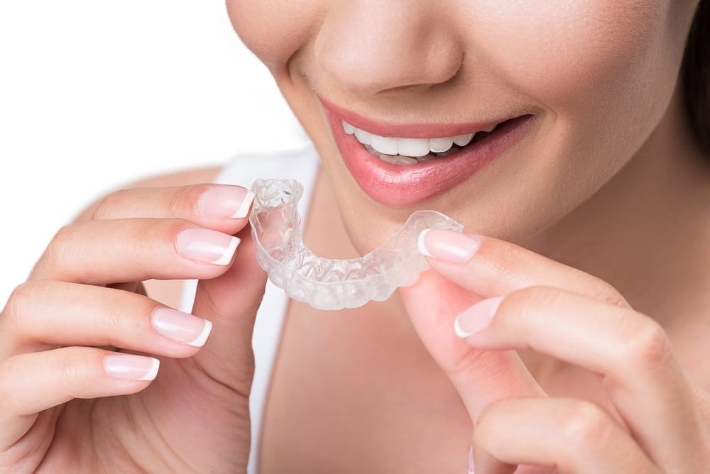 clean your retainers to prevent bad breath 