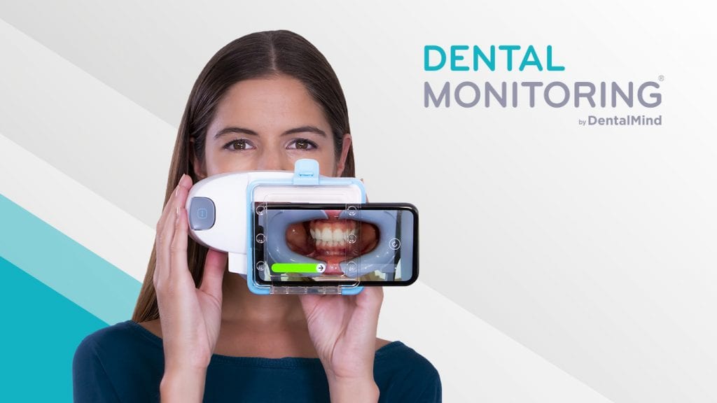girl showing how dental monitoring in okc works.